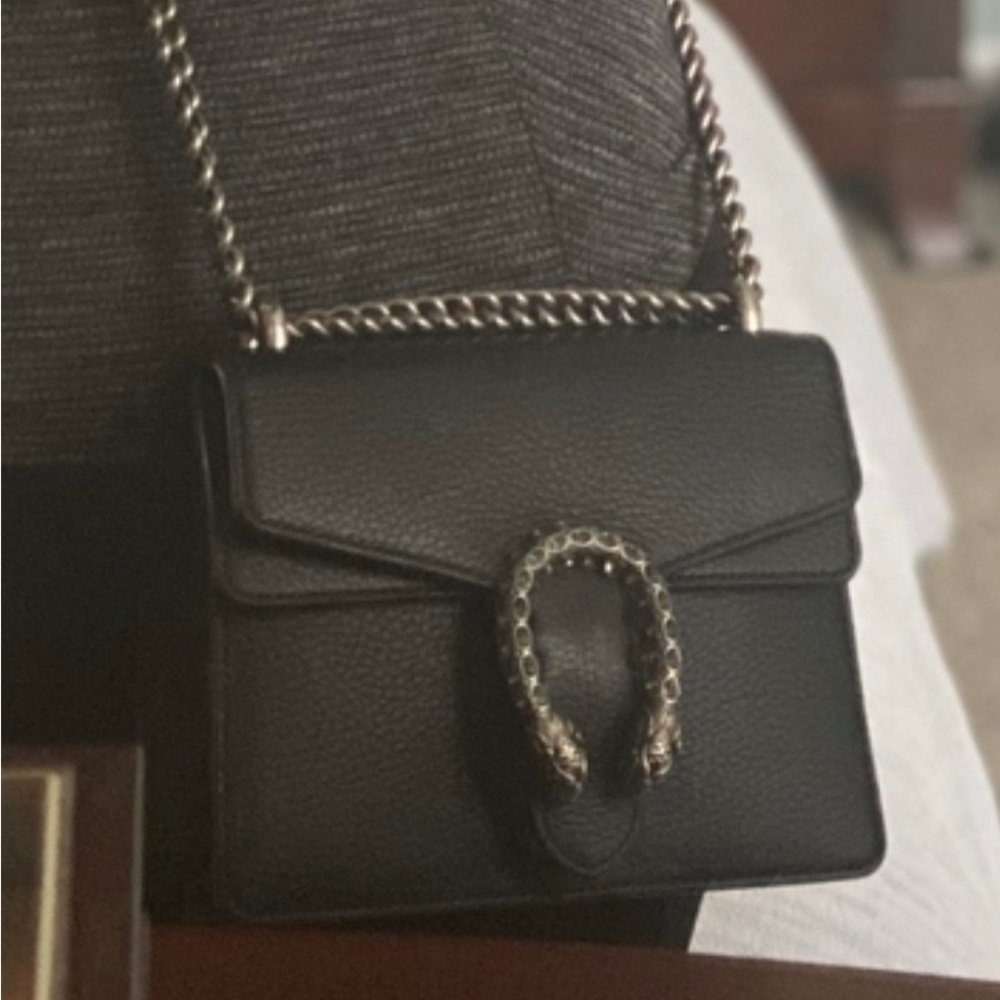 Black Gucci serpent bag